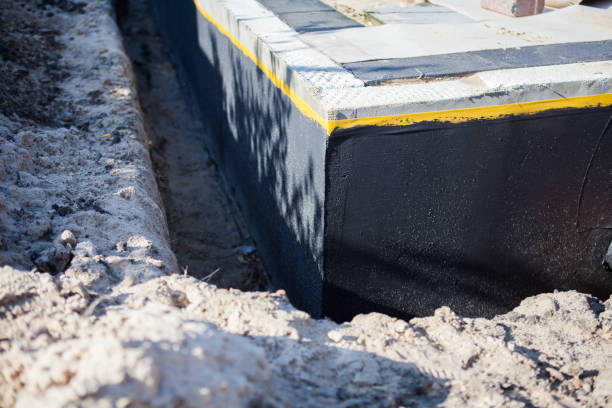 Professional Basement Waterproofing technician working in Swayzee, IN